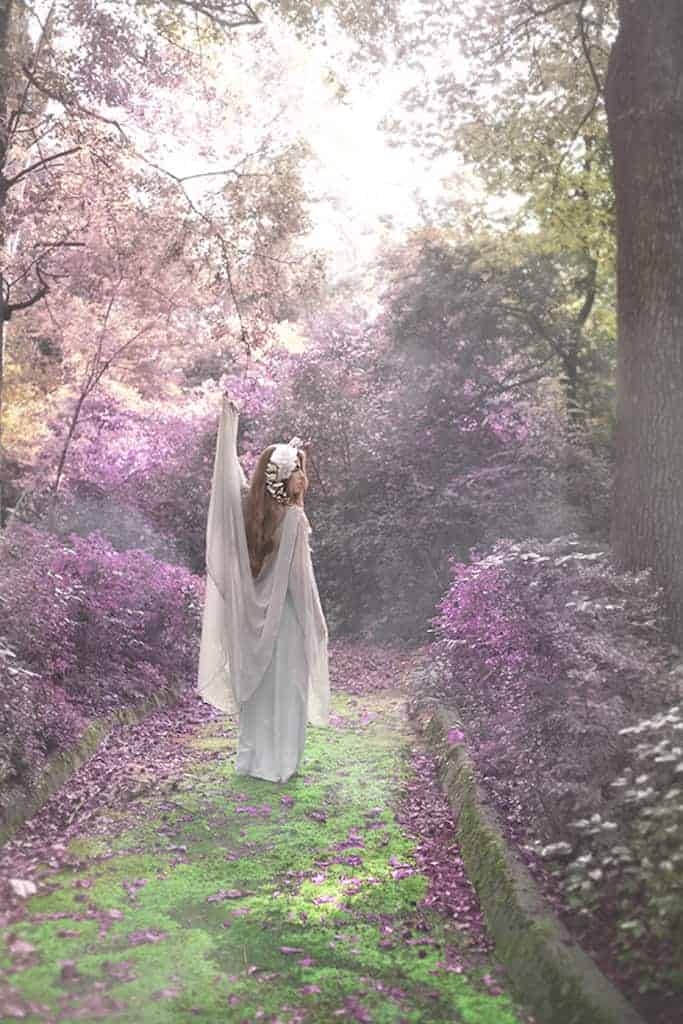 A fantasy portrait of Jana in a whimsical purple forest